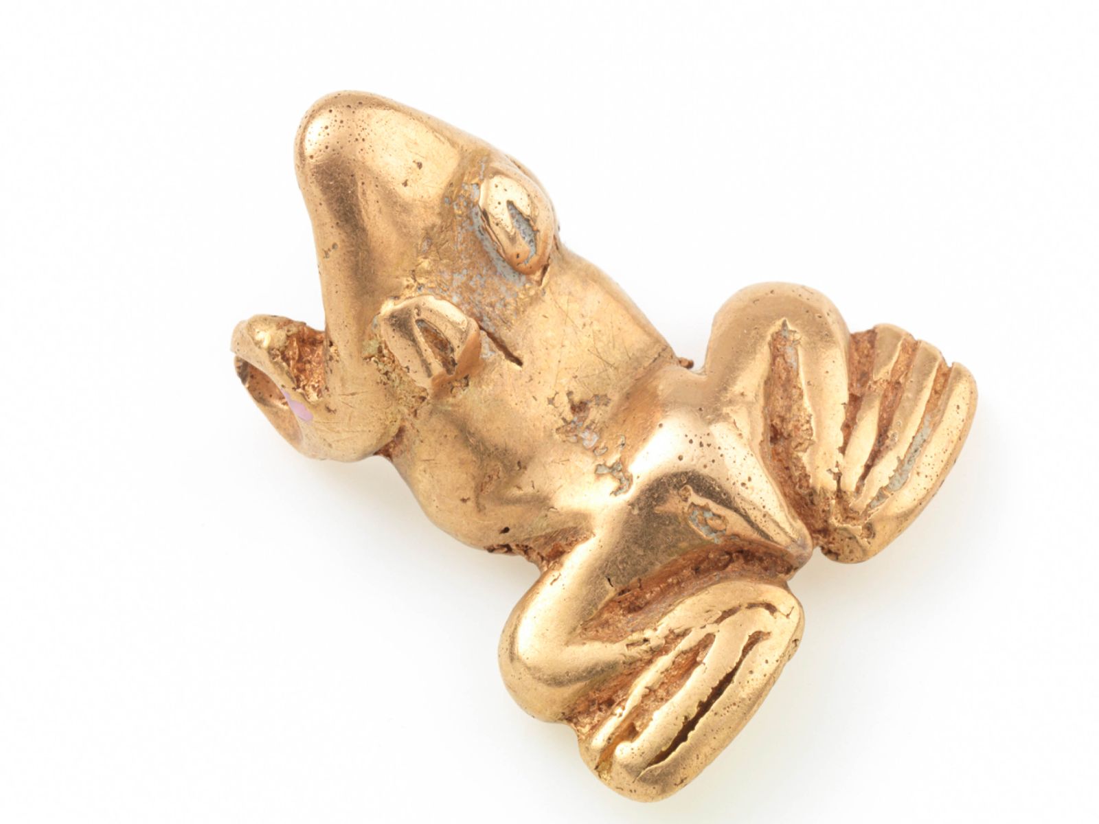 Figurine de grenouille en or vue de dessus